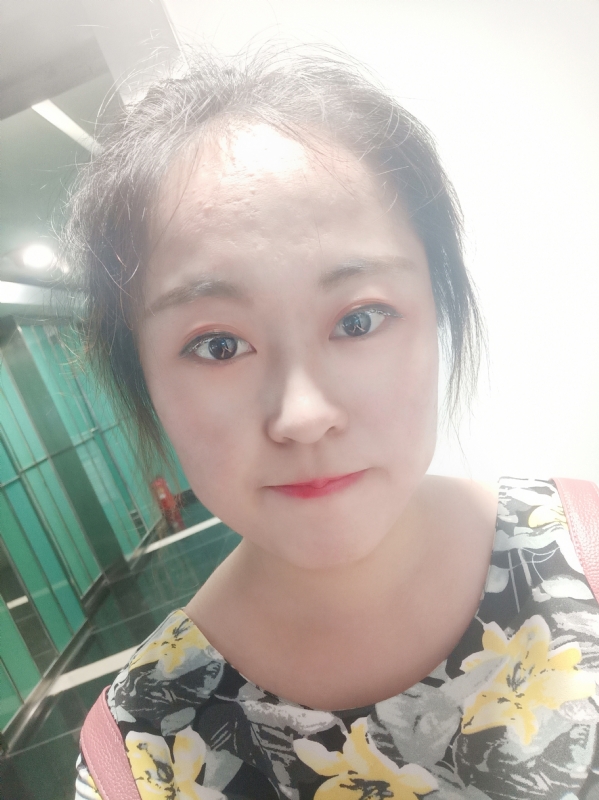 小花伞的第一张照片--九江相亲服务中心